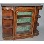 A GOOD VICTORIAN FIGURED WALNUT SHAPED CREDENZA, the front with glass central door enclosing two