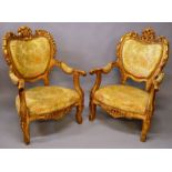 A PAIR OF FRENCH STYLE GILT FRAMED ARMCHAIRS with carved show wood frame, the backs and seats