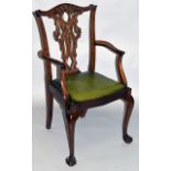 A CHIPPENDALE STYLE MAHOGANY DESK CHAIR.