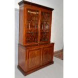 A GOOD VICTORIAN MAHOGANY INLAID STANDING BOOKCASE, the top with a pair of astragal doors