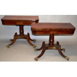 A PAIR OF REGENCY ROSEWOOD AND BRASS INLAID FOLD-OVER CARD TABLES, with “D” shaped fold-over tops