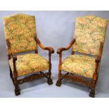 A PAIR OF FRENCH STYLE ARMCHAIRS, with carved beech arms and legs, the backs and seats upholstered