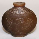 A CHINESE BROWN JADE SNUFF BOTTLE, 2.1in high.
