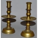 A MINIATURE PAIR OF BRASS CANDLESTICKS. 4.5ins high.