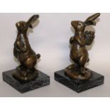 MILO A PAIR OF RABBITS. 5ins high. Signed.