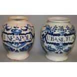 A PAIR OF DELFT BLUE AND WHITE SPICE JARS, U. NEAPOLI AND U. BASIL, FLA. 7ins high.