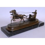 V. GRACHET A RUSSIAN BRONZE HORSE AND SLEIGH. Signed. 9ins long, on a marble base.