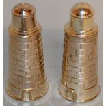 A PAIR OF LIGHTHOUSE PEPPERETTES.