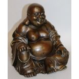 A BRONZE SEATED BUDDHA. 7ins high.