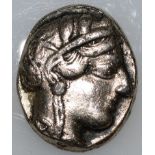 A SILVER ROMAN COIN.