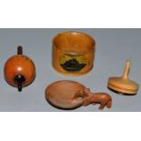 TWO TREEN SPINNING TOPS, Mauchelin “Mont St-Michel” serviette ring and small carved elephant spoon.