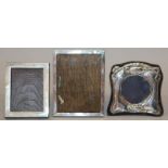 THREE SMALL SILVER PHOTOGRAPH FRAMES.