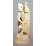 AN EARLY 20TH CENTURY JAPANESE IVORY OKIMONO OF A FISHERMAN, holding a net and standing on a