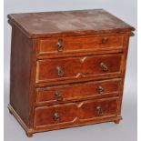 AN APPRENTICES 19TH CENTURY OAK FOUR DRAWER CHEST. 9ins wide.