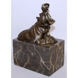 MILO A BRONZE GROUP, HIPPO. Signed. 5ins long, on a marble plinth.