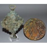 TWO SMALL BRONZE SEALS, one of circular form, the other of square shape with swivel mounts. 3ins and