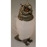 A VERY GOOD OWL CLARET JUG with plated head, glass eyes and feet. 11ins high.