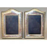 A PAIR OF UPRIGHT EASEL PHOTOGRAPH FRAMES with serpentine tops. 8ins high x 5.25ins wide. London