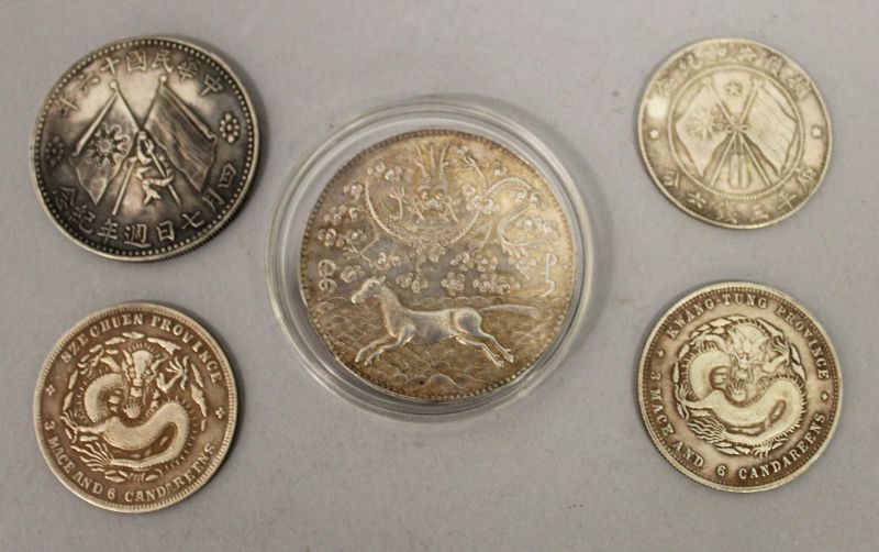A GROUP OF FIVE CHINESE COINS, one with a Perspex case, 1.75in diameter and smaller. (5)