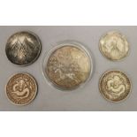 A GROUP OF FIVE CHINESE COINS, one with a Perspex case, 1.75in diameter and smaller. (5)