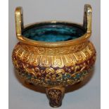 A CHINESE ENAMELLED GILT BRONZE TRIPOD CENSER, weighing 510gm, the sides decorated in high relief,