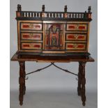 AN 18TH CENTURY SPANISH VARGUENO ON STAND, the top with turned spindles over a fitted front with