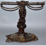 A SUPERB VICTORIAN CAST IRON COALBROOKDALE STICK STAND formed as a dog standing on his hind legs and