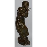 PAUL DUBOIS (1827-1905) FRENCH A LARGE BRONZE OF A YOUNG MAN who has burnt his fingers. Signed.