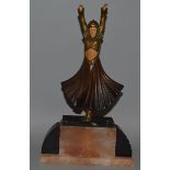 AN ART DECO GILDED BRONZE DANCER on an onyx base. 12ins high.