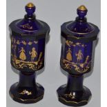 A SUPERB PAIR OF 18TH CENTURY OCTAGONAL BLUE GOBLETS AND COVERS decorated with Georgian figures in