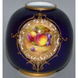 A SMALL ROYAL WORCESTER VASE, Pattern No. 2491, rich blue ground painted with fruit.