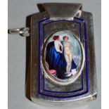 AN ART DECO SILVER AND BLUE ENAMEL VESTA.