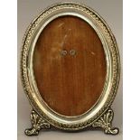 A FRENCH SILVER OVAL PHOTOGRAPH FRAME. 6.5ins high x 4.75ins wide.