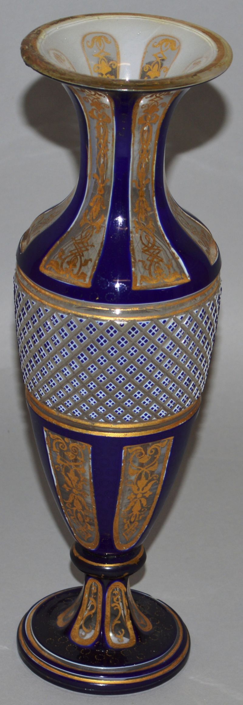 A BOHEMIAN GILT AND WHITE OVERLAY VASE painted with panels of flowers, 9.5ins high (AF) and a BLUE - Image 3 of 3