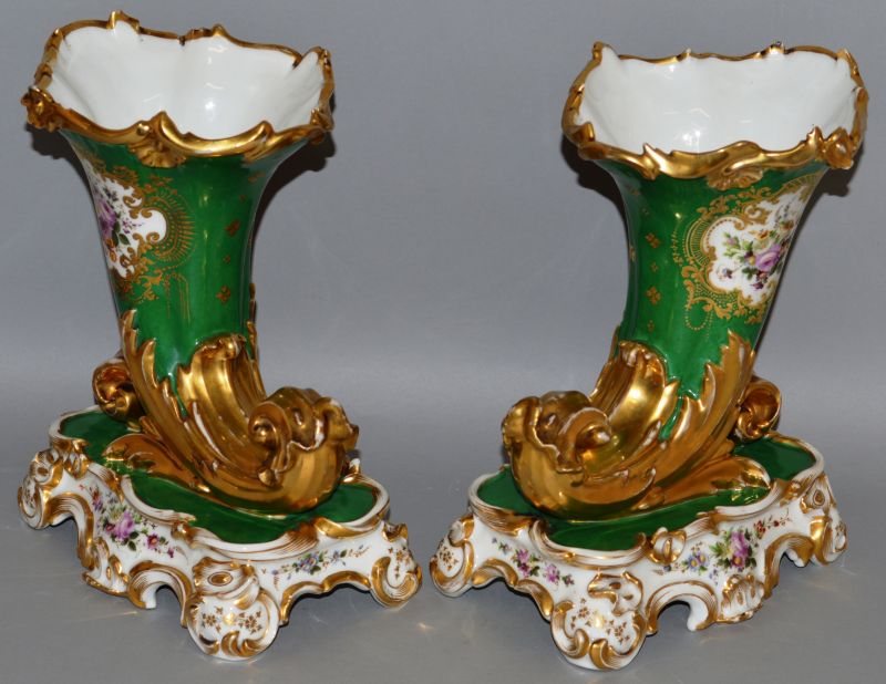 A GOOD PAIR OF PARIS APPLE GREEN CORNUCOPIA VASES painted with panels of flowers on a gilt and white