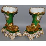 A GOOD PAIR OF PARIS APPLE GREEN CORNUCOPIA VASES painted with panels of flowers on a gilt and white