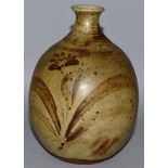 A POTTERY STUDIO BULBOUS VASE with Japanese style decoration, leaves and flowers.