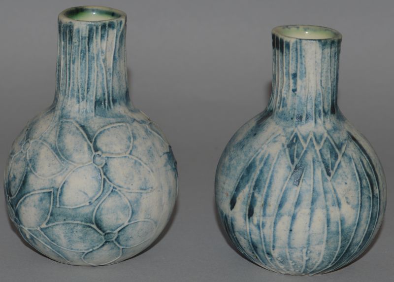 A SMALL PAIR OF CARN POTTERY VASES. 4ins high.