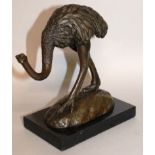 MILO A BRONZE OSTRICH. Signed. 6ins high, on a marble base.