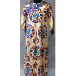 A CHINESE FLORAL DECORATED SILK ROBE with similar belt.