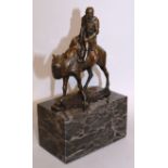 L. CORVIN A BRONZE OF A MAN RIDING A CAMEL. Signed. 5.75ins high, on a marble base.