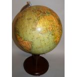 A GLOBE OF THE WORLD on a circular stand. 12ins diameter.