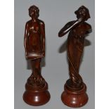 A PAIR OF ART NOUVEAU BRONZE FIGURES OF YOUNG LADIES on marble bases. 8.5ins high.