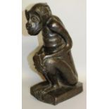 JOSEPH MENDES DA COSTA (DUTCH) CIRCA. 1900 A GOOD BRONZE OF A SEATED MONKEY. Monogrammed. 13ins