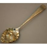 A GEORGE III ENGRAVED BERRY SPOON. London 1768.