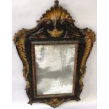 AN 18TH CENTURY CARVED OAK PIER MIRROR with traces of gilded and painted decoration, the rectangular