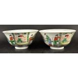 A PAIR OF 19TH CENTURY CHINESE FAMILLE VERTE PORCELAIN BOWLS, each painted in a Kangxi style with