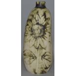 A CARN POTTERY PENZANCE CORNWALL VASE by JOHN BEUSMANS decorated with sunflowers. Signed. 11ins