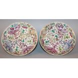 A PAIR OF GOOD QUALITY CHINESE FAMILLE ROSE PORCELAIN PHOENIX DISHES, each decorated in vivid