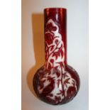 A GOOD 18TH CENTURY CHINESE RED OVERLAY GLASS VASE, the sides of the bottle-form vase carved through